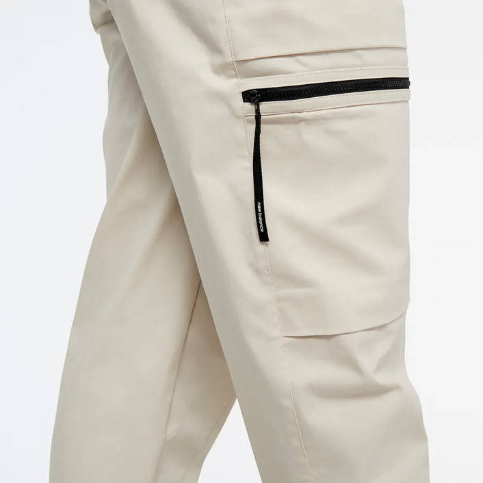 New Balance SPODNIE AT WOVEN PANT WP31506TWF