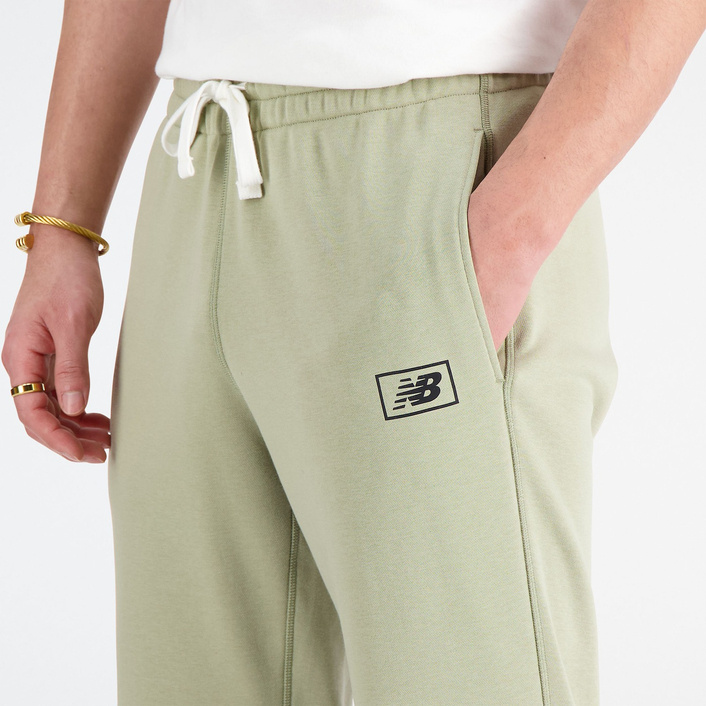 New Balance SPODNIE NB ESSENTIALS SWEATPANT MP33509FUG